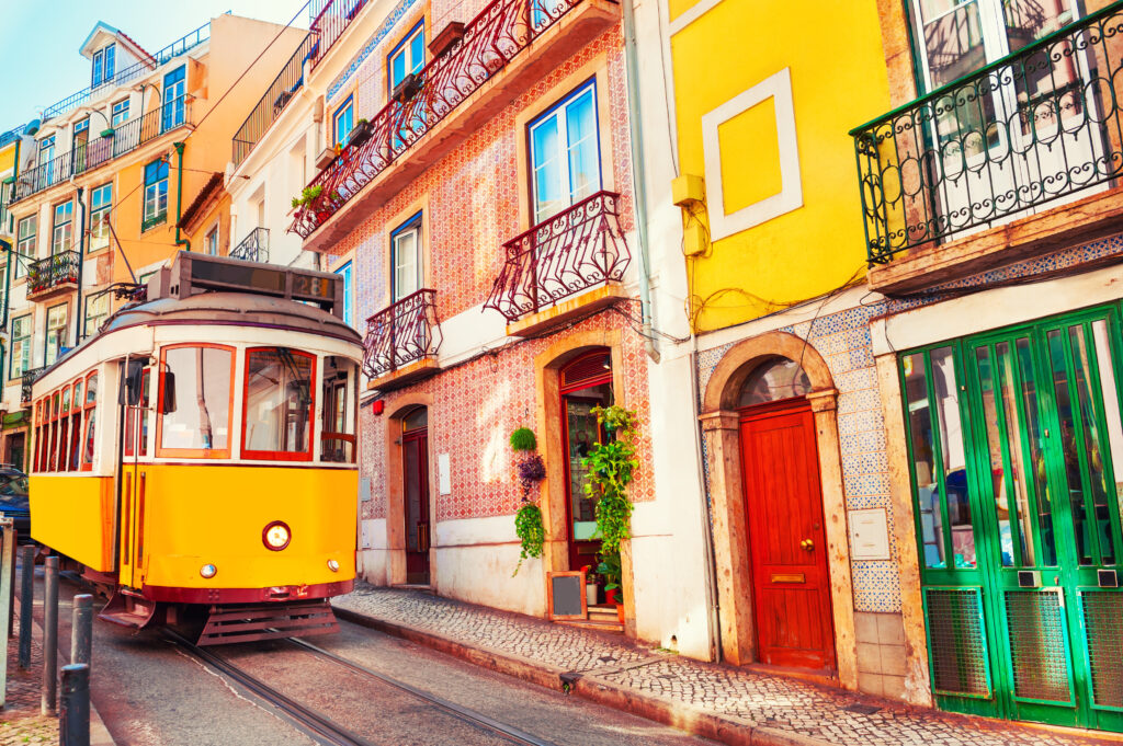 Yellow Vintage Tram On the Street in Lisbon