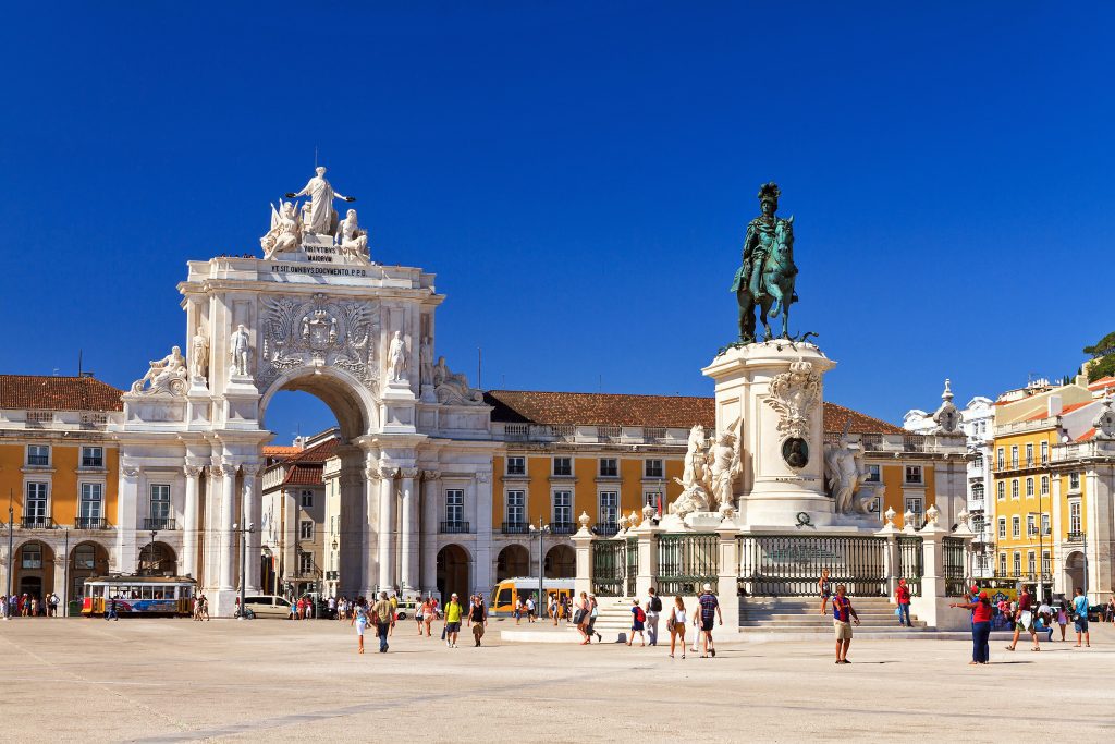 Beautiful image of the gate and statue of King Jose on the Commerce square (Praca do Comercio) in Lisbon, Portugal