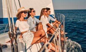 Group of people on a catamaran tour in Lisbon.