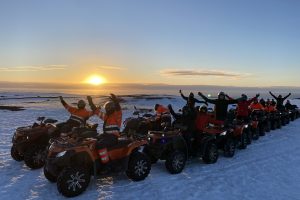 ATV Tour in the snow at sunset.