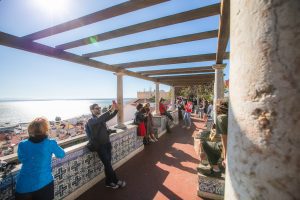 Tourist is taking a selfie, view point Lisbon city.