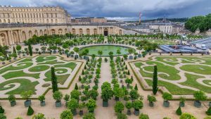 Famous palace Versailles with beautiful gardens and fountains