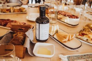 Olive Oil testing, table prepared with olive oil and other foods.