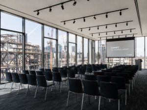 Daylit meeting room set up for a corporate group in Milan